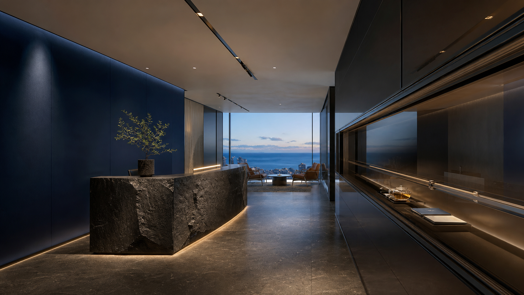 Premium Invesco arrival lounge with a concealed service rail and sea view.